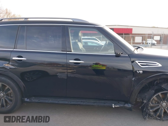 2019 Nissan Armada Platinum with VIN JN8AY2NE2K9759121, listed as a IAAI auction lot 41115008 with 89,991 mi miles. Bid and sale history available at carsss.com. Image 14.