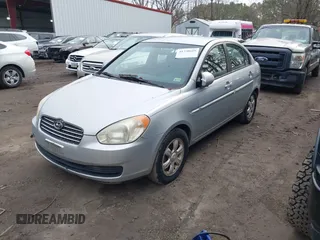 2006 Hyundai Accent GLS with VIN KMHCN46C46U012561, listed as a IAAI auction lot 41750609 with 286,770 mi miles. Bid and sale history available at carsss.com. Image 2.