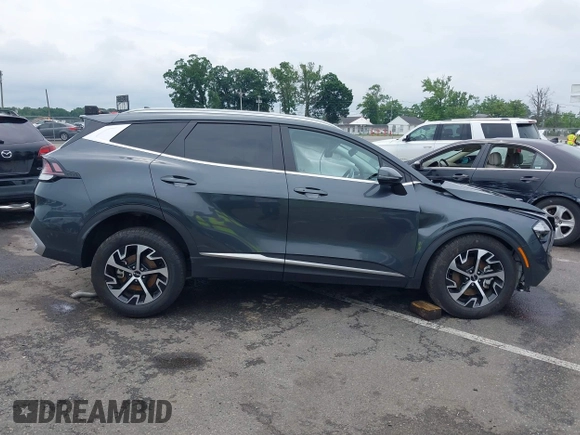 2023 Kia Sportage EX with VIN KNDPVCAG1P7110909, listed as a IAAI auction lot 42646436 with 16,304 mi miles and . Bid and sale history available at DreamBid. Image 13.