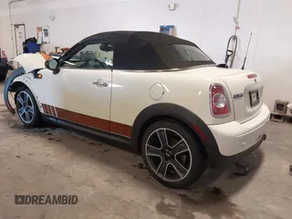2013 MINI Roadster with VIN WMWSY1C52DT625564, listed as a IAAI auction lot 41442864 with 98,240 mi miles and . Bid and sale history available at DreamBid. Image 3.