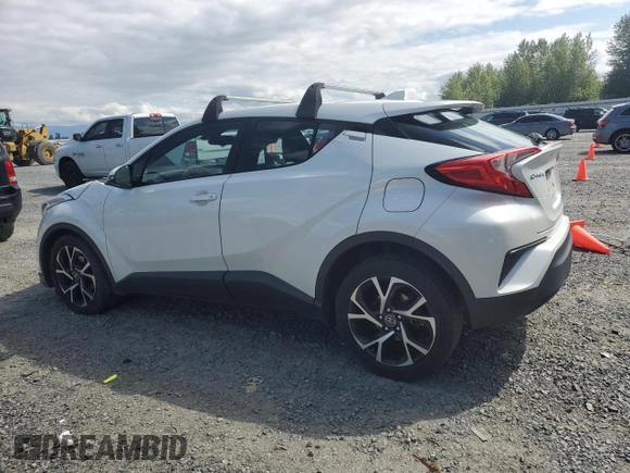 2018 Toyota C-HR XLE with VIN NMTKHMBX9JR060424, listed as a Copart auction lot 57913775 with 104,847 mi miles and Salvage title. Bid and sale history available at DreamBid. Image 2.
