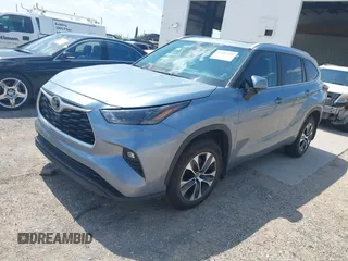 2023 Toyota Highlander L with VIN 5TDKDRBH5PS012608, listed as a IAAI auction lot 42702499 with 61,129 mi miles and . Bid and sale history available at DreamBid. Image 2.