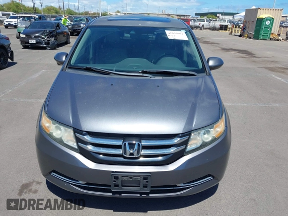 2014 Honda Odyssey EX-L with VIN 5FNRL5H69EB018557, listed as a IAAI auction lot 42855051 with 165,081 mi miles and . Bid and sale history available at DreamBid. Image 6.
