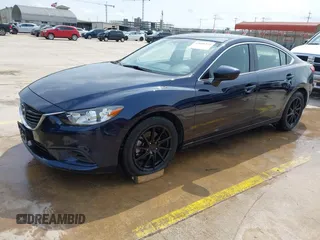 2015 Mazda 6 i Sport with VIN JM1GJ1U52F1201571, listed as a IAAI auction lot 42096344 with 88,290 mi miles and . Bid and sale history available at DreamBid. Image 2.