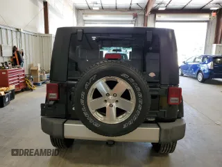 2008 Jeep Wrangler Unlimited Sahara with VIN 1J4GA59108L637009, listed as a Copart auction lot 63333705 with 181,778 mi miles and Clean title. Bid and sale history available at DreamBid. Image 6.