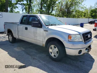 2007 Ford F-150 STX with VIN 1FTRX12W87FB51282, listed as a Copart auction lot 55580365 with 213,923 mi miles and Salvage title. Bid and sale history available at DreamBid. Image 4.