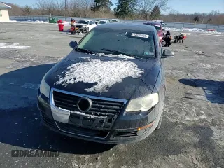 2009 Volkswagen Passat Komfort z VIN WVWJK73C79P056163, wystawiony jako Copart lot #42095525 z przebiegiem 132 709 mil mil oraz Szkoda całkowita • Salvage title. Historia ofert i sprzedaży dostępna na DreamBid. Obrazek 11.
