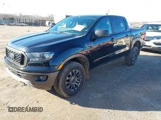 2019 Ford Ranger XL with VIN 1FTER4EH3KLA32962, listed as a IAAI auction lot 41595011 with 106,253 mi miles. Bid and sale history available at carsss.com. Image 2.
