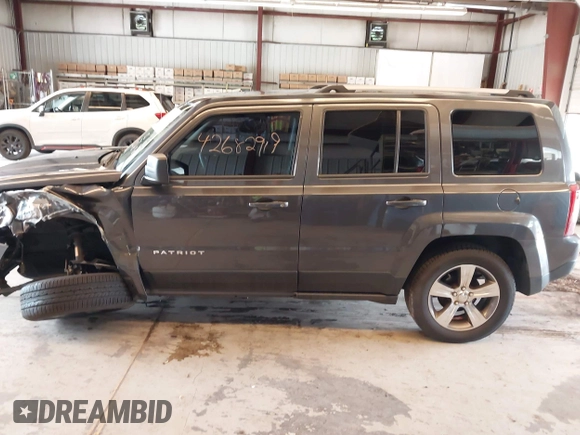 2016 Jeep Patriot Latitude with VIN 1C4NJRFB4GD804403, listed as a IAAI auction lot 42682919 with 105,360 mi miles and . Bid and sale history available at DreamBid. Image 14.