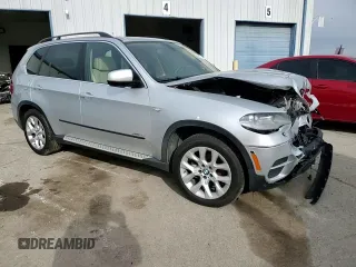 2013 BMW X5 xDrive35i z VIN 5UXZV4C54D0E10167, wystawiony jako Copart lot #86497414 z przebiegiem 95 519 mil mil oraz Szkody całkowita. Historia ofert i sprzedaży dostępna na DreamBid. Obrazek 16.