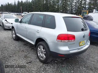 2006 Volkswagen Touareg 4.2L V8 z VIN WVGZM77L06D043948, wystawiony jako IAAI lot #41839431 z przebiegiem 207 496 mil mil oraz . Historia ofert i sprzedaży dostępna na DreamBid. Obrazek 3.