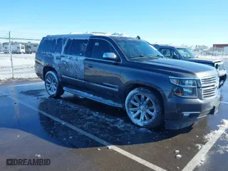 2017 Chevrolet Suburban Premier with VIN 1GNSKJKC0HR274605, listed as a IAAI auction lot 41828392 with 144,747 mi miles. Bid and sale history available at carsss.com. Image 1.