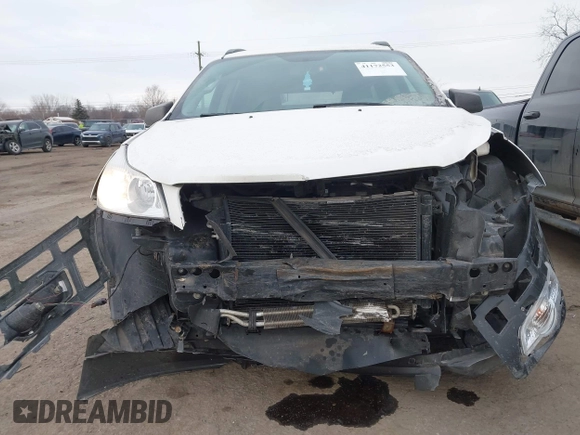 2012 Chevrolet Traverse LS z VIN 1GNKREED8CJ373705, wystawiony jako IAAI lot #41172553 z przebiegiem 101 410 mil mil oraz . Historia ofert i sprzedaży dostępna na DreamBid. Obrazek 13.