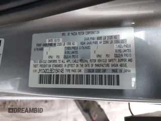 2014 Mazda 5 Touring with VIN JM1CW2CL6E0164146, listed as a IAAI auction lot 41458945 with 157,345 mi miles. Bid and sale history available at carsss.com. Image 9.