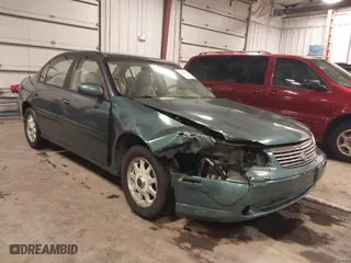 1998 Chevrolet Malibu LS with VIN 1G1NE52M6W6104642, listed as a IAAI auction lot 41636923 with 116,944 mi miles. Bid and sale history available at carsss.com. Image 1.