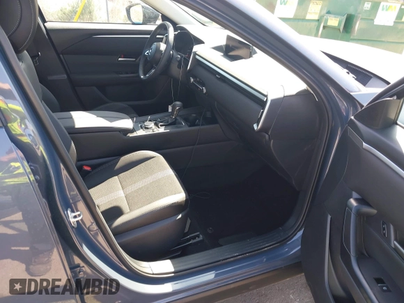 2025 Mazda CX-50 S Select z VIN 7MMVABAM9SN348045, wystawiony jako IAAI lot #42077636 z przebiegiem 2 211 mil mil oraz . Historia ofert i sprzedaży dostępna na DreamBid. Obrazek 5.