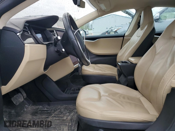 2014 Tesla Model S 60 with VIN 5YJSA1H19EFP51003, listed as a Copart auction lot 52164335 with 105,926 mi miles and Salvage Title. Bid and sale history available at DreamBid. Image 7.