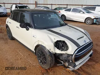2015 MINI Hardtop 4 Door S z VIN WMWXU3C50F2B59450, wystawiony jako IAAI lot #41271841 z przebiegiem 70 719 mil mil oraz . Historia ofert i sprzedaży dostępna na DreamBid. Obrazek 6.