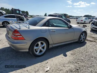 2003 Mercedes-Benz SLK 320 with VIN WDBKK65F03F286130, listed as a Copart auction lot 61544385 with 98,899 mi miles and Salvage title. Bid and sale history available at DreamBid. Image 3.