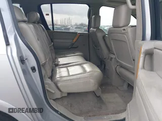 2004 Infiniti QX56 with VIN 5N3AA08C14N811706, listed as a IAAI auction lot 41616710 with 222,954 mi miles. Bid and sale history available at carsss.com. Image 8.