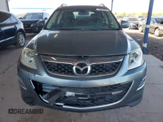 2012 Mazda CX-9 Grand Touring z VIN JM3TB2DA6C0348788, wystawiony jako Copart lot #52444915 z przebiegiem 130 392 mil mil oraz Szkoda całkowita • Salvage title. Historia ofert i sprzedaży dostępna na DreamBid. Obrazek 5.