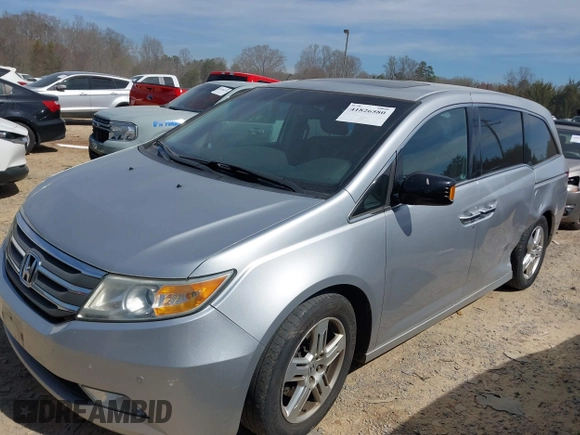 2012 Honda Odyssey Touring with VIN 5FNRL5H92CB108690, listed as a IAAI auction lot 41826580 with 150,327 mi miles and . Bid and sale history available at DreamBid. Image 18.