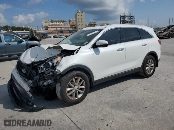 2017 Kia Sorento LX z VIN 5XYPG4A34HG220340, wystawiony jako Copart lot #57467775 z przebiegiem 144 612 mil mil oraz Szkoda całkowita • Salvage title. Historia ofert i sprzedaży dostępna na DreamBid. Obrazek 1.