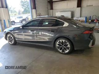 2024 BMW 5 Series 530i with VIN WBA43FJ00RCR87900, listed as a Copart auction lot 74471474 with 2,422 mi miles and Salvage Title. Bid and sale history available at carsss.com. Image 2.