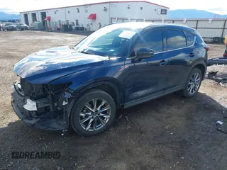 2019 Mazda CX-5 Signature with VIN JM3KFBEY5K0609063, listed as a IAAI auction lot 41802772 with 104,112 mi miles. Bid and sale history available at carsss.com. Image 18.