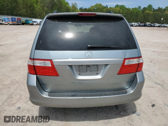 2007 Honda Odyssey EX-L with VIN 5FNRL38657B059033, listed as a Copart auction lot 54005495 with 212,674 mi miles and Salvage Title. Bid and sale history available at DreamBid. Image 6.