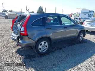 2011 Honda CR-V LX z VIN 5J6RE3H36BL023593, wystawiony jako IAAI lot #42107590 z przebiegiem 95 260 mil mil oraz . Historia ofert i sprzedaży dostępna na DreamBid. Obrazek 4.