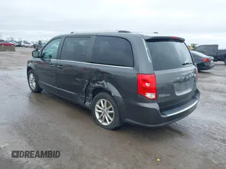 2019 Dodge Grand Caravan SXT with VIN 2C4RDGCG3KR543221, listed as a IAAI auction lot 41528859 with 129,778 mi miles and . Bid and sale history available at DreamBid. Image 6.