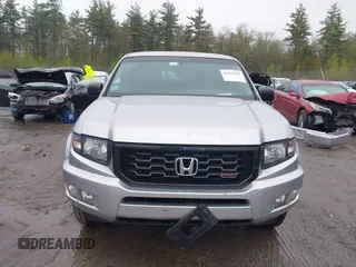 2012 Honda Ridgeline Sport z VIN 5FPYK1F77CB459174, wystawiony jako IAAI lot #42158366 z przebiegiem 131 988 mil mil oraz . Historia ofert i sprzedaży dostępna na DreamBid. Obrazek 13.