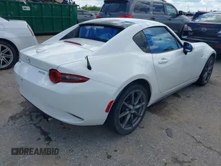 2020 Mazda MX-5 Miata Grand Touring z VIN JM1NDAM79L0411456, wystawiony jako IAAI lot #42229479 z przebiegiem 63 508 mil mil oraz . Historia ofert i sprzedaży dostępna na DreamBid. Obrazek 4.