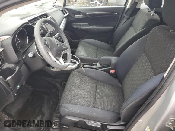 2015 Honda Fit LX z VIN 3HGGK5H58FM768130, wystawiony jako Copart lot #58184435 z przebiegiem 67 968 mil mil oraz Szkoda całkowita • Salvage title. Historia ofert i sprzedaży dostępna na DreamBid. Obrazek 7.