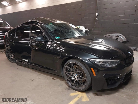 2018 BMW M3 with VIN WBS8M9C5XJ5L71599, listed as a IAAI auction lot 41932825 with 53,730 mi miles. Bid and sale history available at carsss.com. Image 1.