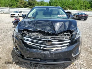2017 Cadillac XT5 Luxury FWD с VIN 1GYKNBRS0HZ150007, выставлен на аукционе Copart как лот 54745505 с пробегом 37 271 миль миль и Списание • Salvage title. История ставок и продаж доступна на DreamBid. Изображение 5.
