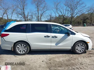 2019 Honda Odyssey LX with VIN 5FNRL6H23KB049236, listed as a IAAI auction lot 41633339 with 96,000 mi miles and . Bid and sale history available at DreamBid. Image 13.