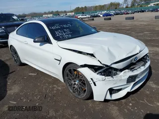 2019 BMW M4 with VIN WBS4Y9C5XKAG67446, listed as a IAAI auction lot 41669865 with 103,230 mi miles. Bid and sale history available at carsss.com. Image 1.