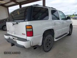 2004 GMC Yukon Denali z VIN 1GKEK63U84J148225, wystawiony jako IAAI lot #42218451 z przebiegiem 296 149 mil mil oraz . Historia ofert i sprzedaży dostępna na DreamBid. Obrazek 4.