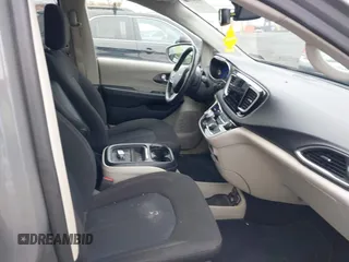 2020 Chrysler Pacifica Touring with VIN 2C4RC1FG3LR245765, listed as a IAAI auction lot 42069689 with 40,869 mi miles and . Bid and sale history available at DreamBid. Image 5.