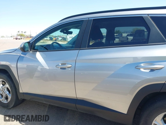 2023 Hyundai Tucson SEL z VIN 5NMJBCAE7PH239761, wystawiony jako IAAI lot #42159276 z przebiegiem 24 400 mil mil oraz . Historia ofert i sprzedaży dostępna na DreamBid. Obrazek 14.
