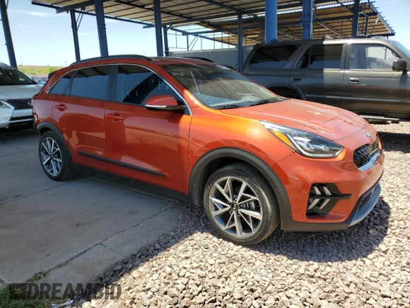 2021 Kia Niro Touring with VIN KNDCC3LC5M5466642, listed as a Copart auction lot 60411074 with 79,861 mi miles and Salvage Title. Bid and sale history available at carsss.com. Image 4.