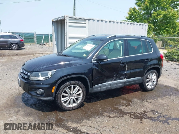2012 Volkswagen Tiguan SE z VIN WVGBV7AX1CW548133, wystawiony jako IAAI lot #42403164 z przebiegiem 139 083 mil mil oraz . Historia ofert i sprzedaży dostępna na DreamBid. Obrazek 14.