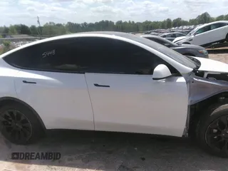 2022 Tesla Model Y Long Range z VIN 7SAYGDEE3NF385933, wystawiony jako IAAI lot #42059675 z przebiegiem 88 488 mil mil oraz . Historia ofert i sprzedaży dostępna na DreamBid. Obrazek 12.