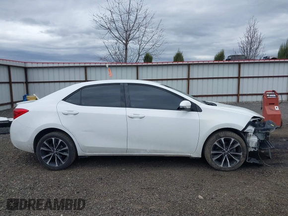 2019 Toyota Corolla L with VIN 5YFBURHE1KP937059, listed as a IAAI auction lot 41901278 with 98,796 mi miles and . Bid and sale history available at DreamBid. Image 14.