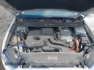 2014 Ford Fusion SE Hybrid z VIN 3FA6P0LU3ER391680, wystawiony jako IAAI lot #42643934 z przebiegiem 102 578 mil mil oraz . Historia ofert i sprzedaży dostępna na DreamBid. Obrazek 10.