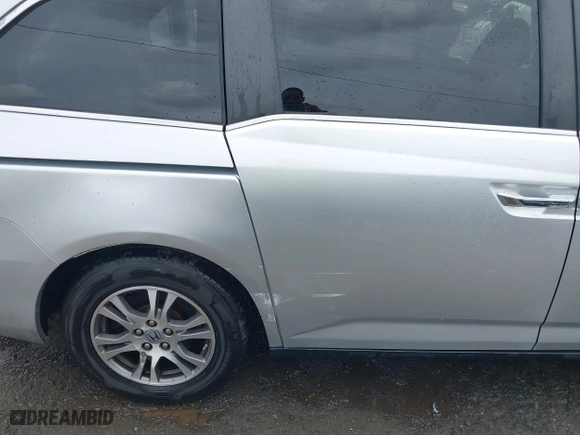 2011 Honda Odyssey EX-L with VIN 5FNRL5H69BB031983, listed as a IAAI auction lot 41947443 with 148,111 mi miles. Bid and sale history available at carsss.com. Image 18.