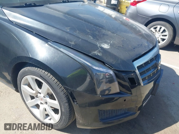 2013 Cadillac ATS z VIN 1G6AA5RA8D0139683, wystawiony jako IAAI lot #42410090 z przebiegiem 127 323 mil mil oraz . Historia ofert i sprzedaży dostępna na DreamBid. Obrazek 14.