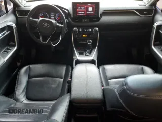 2019 Toyota RAV4 XLE Premium with VIN JTMA1RFV5KD026145, listed as a Copart auction lot 48238125 with 101,443 mi miles and Salvage Title. Bid and sale history available at carsss.com. Image 8.